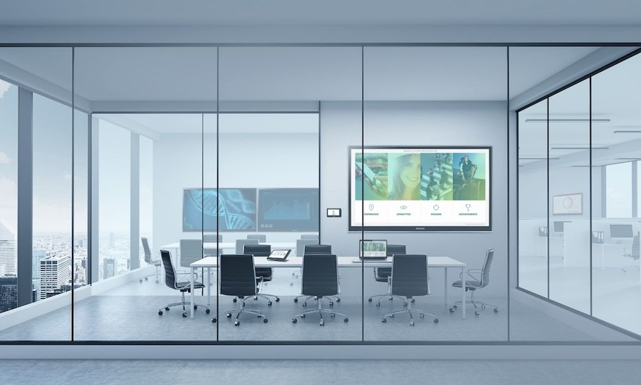 A modern conference room with commercial audio video solutions. 